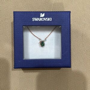 Swarovski gold chain necklace with emerald green stone